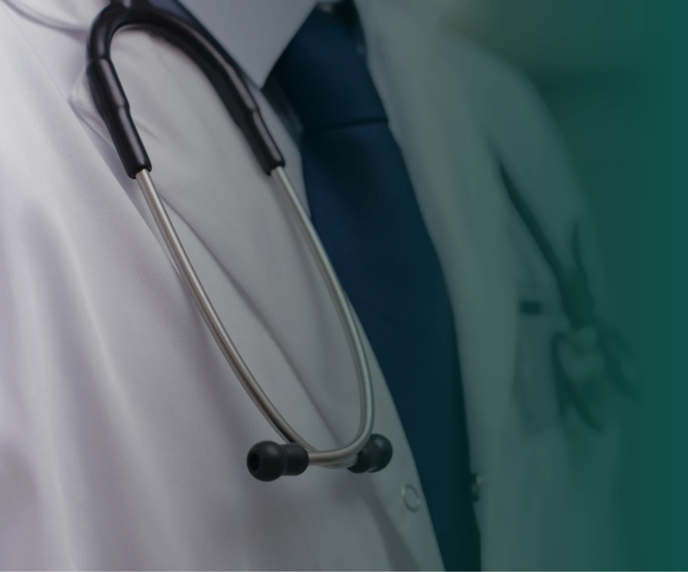 Dana Cowles in a white coat with a stethoscope